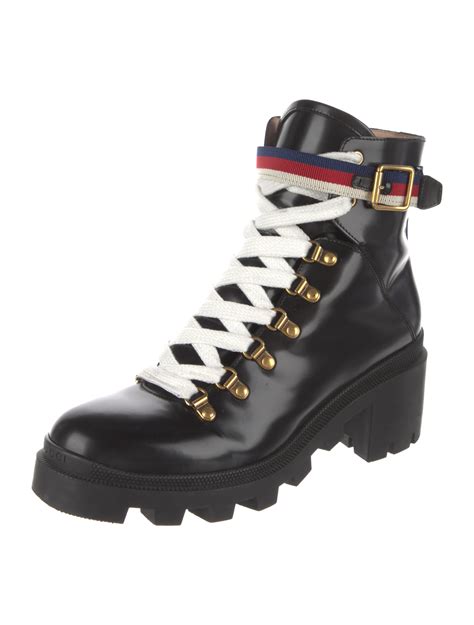 gucci sylvie black combat boots with web stripe|gucci leather boots.